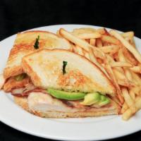 Grilled Chicken Club Sandwich · Bacon, avocado, swiss, grilled sourdough, side dish.