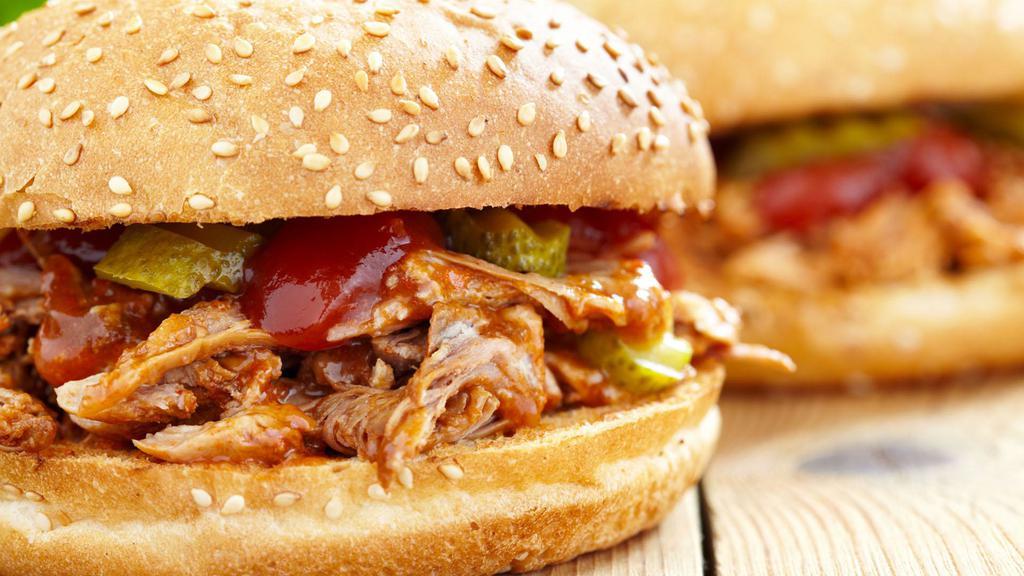 Super Adobada (Pork Adobo) Torta · Mouthwatering Mexican-style Sandwich prepared with Pork Adobo, beans, jalapeños, lettuce, tomato, white onions, salsa, and mayo.
