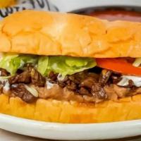 Super Deshebrada (Shredded Beef) Torta · Mouthwatering Mexican-style Sandwich prepared with Shredded beef, beans, jalapeños, lettuce,...