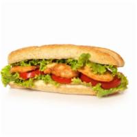 Super Fish Torta · Mouthwatering Mexican-style Sandwich prepared with Fish, beans, jalapeños, lettuce, tomato, ...