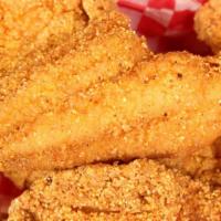 Fried Fish Basket · Hot & Tasty Cajun fish, seasoned and fried to perfection. Served on a bed of fries.