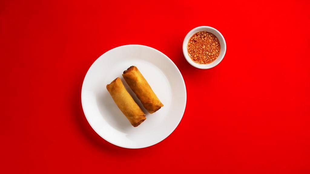 Spicy Egg Rolls (5) · Golden flaky veggie filled egg rolls with a sweet and sour dipping sauce.