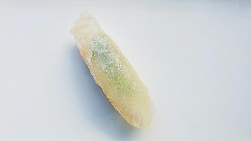 Halibut · 1 pc Hirame (kelp cured), Jeju Island, Korea
Ponzu dressing, shiso leaf
(wasabi is pre-seasoned)