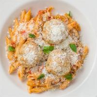 Penne Bolognese & Chicken Meatballs · Spicy sausage, red pepper, tomato cream, parmesan.