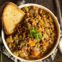 Lentil Soup With Bread · Fresh lentil soup made with red lentils, tomatoes, pepper paste and mint. Served with warm h...