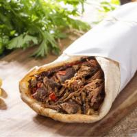 Adana Wrap · Fresh ground lamb, hummus, lettuce, sliced tomatoes, diced cucumbers, bell peppers, onions t...