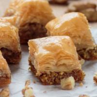 Walnut Baklava (Two Pieces) · Fresh mediterranean pastry with walnuts and honey on wafers.