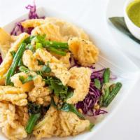 Salt & Pepper Calamari · Crisp calamari wok-tossed with garlic, cilantro, & spring onions; served with a cilantro emu...