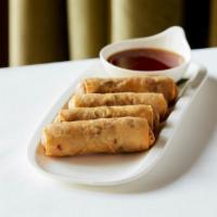 Taro Root Rolls · Vegetarian.  Crisp rolls filled with tart root, carrots, mushrooms & glass noodles with a pl...