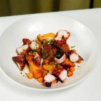 Grilled Octopus · Gluten-free. Grilled octopus, Spanish chorizo, spiced roasted potatoes, & lemon vinaigrette.