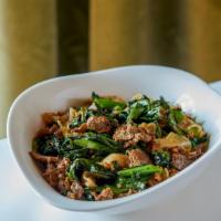 Wok Beef Noodles · Wok-flashed rice noodles tossed with Chinese broccoli, flank steak, eggs, & oyster sauce.