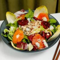 Endive & Orange Salad · Vegetarian. Gluten-free. Escarole, radicchio, endives, orange slices, hazelnut dukkah, blue ...