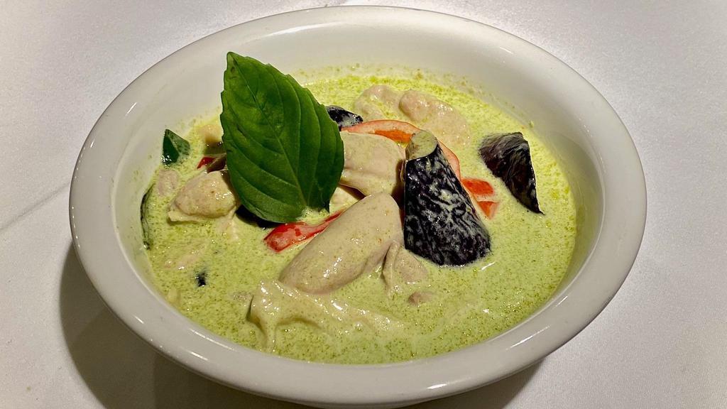Green Chicken Curry · Gluten-free.  Sous vide organic chicken breast, green curry, bamboo shoots, eggplant, peas, Thai basil, & red bell peppers. (medium spicy)
