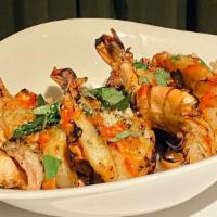 Tiger Prawns & Garlic Noodles · Grilled tiger prawns wok-tossed with egg noodles, Parmesan cheese, oyster sauce, Frenso chil...