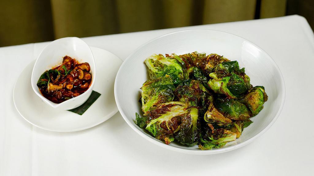 Brussels Sprouts · Gluten-free.  Vegetarian.  Sauteed Brussels Sprouts, with Shiitake mushrooms, basil, & garlic chili sauce.