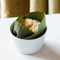 Coconut Rice · Vegan. Gluten-free.  Steamed long-grain rice, vanilla, & roasted coconut flakes.