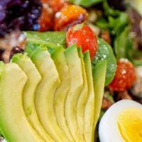 Large Cobb Salad · Marinated, Grilled Chicken Breast, Bacon, Hard Cooked Egg, Avocado, Tomato, Blue Cheese, Mix...