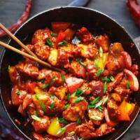 Chilli Chicken (Gravy) · Lightly battered chicken nuggets tossed with Indo-Chinese sauce.