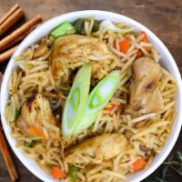 Indo-Chinese Chicken Fried Rice · Long grained rice, tossed with fresh chicken, eggs, vegetables: carrots, beans, bell peppers...