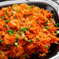 Shrimp Schezwan Rice · Fried Rice tossed with shrimp, bell peppers, carrots, green beans, and peas, in flavorful In...