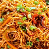 Vegetable Schezwan Noodles · Noodles and Vegetables, bell peppers, carrots, cabbage, onions, tossed in a flavordum Indo-C...