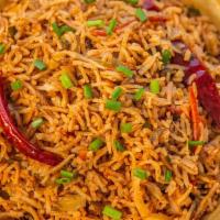 Vegetable Schezwan Rice · Fried Rice tossed with bell peppers, carrots, green beans, and peas, in flavorful Indo-Chine...
