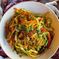 Vegetable Singapore Noodles · Spicy Indo-Chinese Hakka noodles, with carrots, beans, bell pepper, peas, green onions, flav...