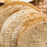 Papad Roasted (2 pcs) · Traditional lentil crisps flash baked in a tandoor.
