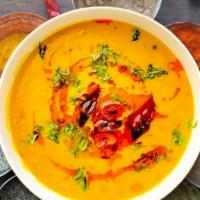 Dal Tadka (Yellow Dal) · A blend of split pea (Toor) and split chickpea (Chana) dal with garlic, curry leaves, cumin ...