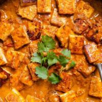 Paneer Tikka Masala · Tandoori paneer cubes cooked in a medium spiced onion and tomato sauce, along with bell pepp...