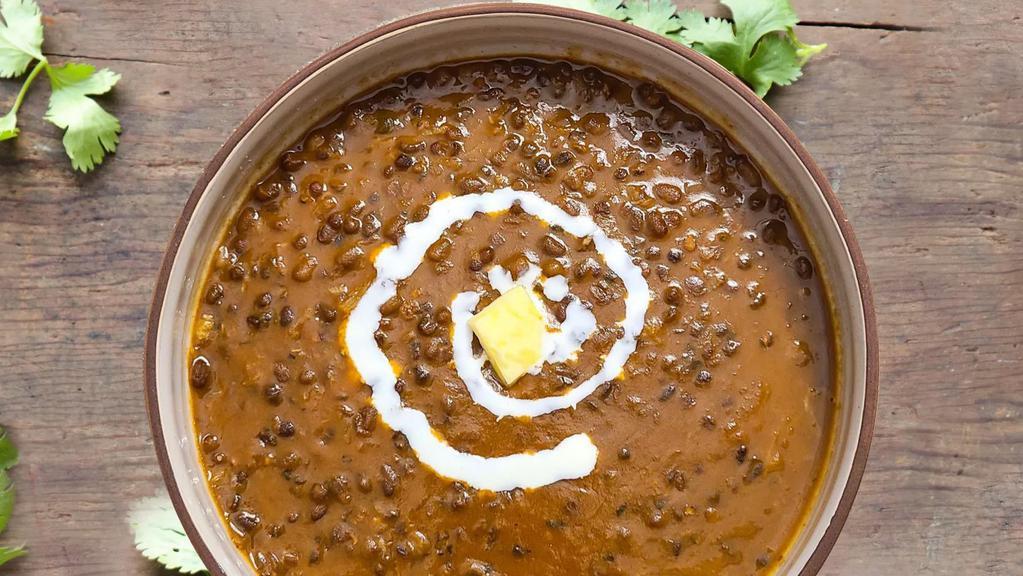 Dal Makhani · Whole black lentil and kidney beans slow-cooked with traditional, spices, butter and cream.