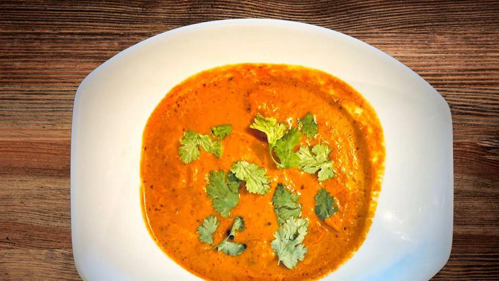Makhani Paneer · Cubes of paneer cooked in a mild tomato and cream sauce with a house blend of spices.