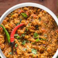 Baingan Bharta · Mashed eggplant cooked with onion tomatoes, ginger, garlic and a house blend of spices.
