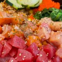 Summer Bowl · Fresh salmon, Ahi Tuna, Hamachi, seaweed salad, cucumber, fried shallot, masago, corn, Unagi...