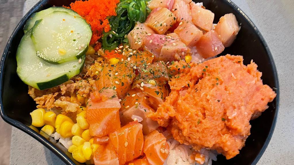 Autumn Bowl · Fresh salmon, Hamachi, Spicy Tuna, seaweed salad, cucumber, fried shallot, jalapeno, edamame, unagi sauce and spicy mayo