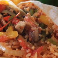 Fajita Burrito · A large flour tortilla filled with grilled bell peppers, onions, mushrooms and tomatoes, ric...