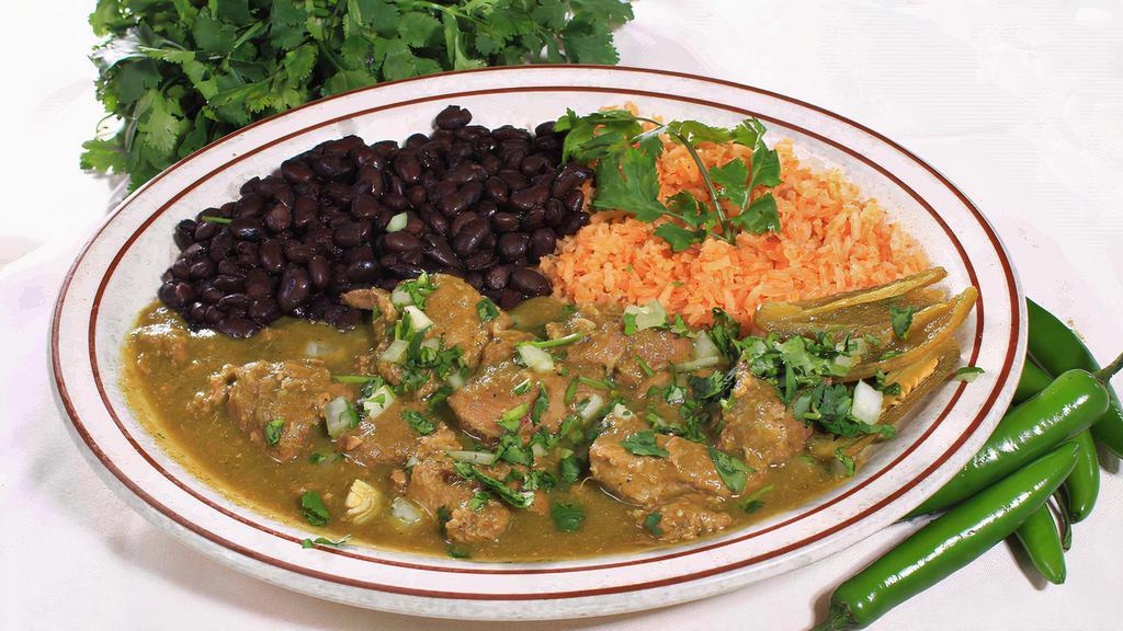 Chile Verde Nayarita with Rice, Beans & Tortillas · Pork loin chunks in a green tomatillo sauce with bell peppers, onions, cilantro, rice, beans, and tortillas