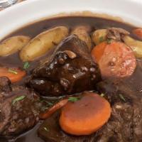 Boeuf Bourguignon · Classic Beef stew with pinot noir & organic vegetables.