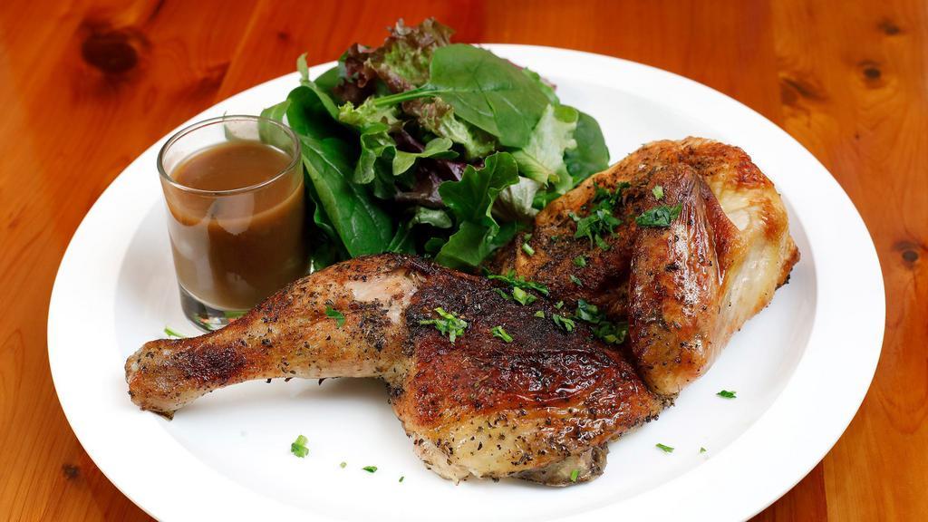 Poulet Roti · Roasted chicken with black truffles sauce & mashed potatoes.