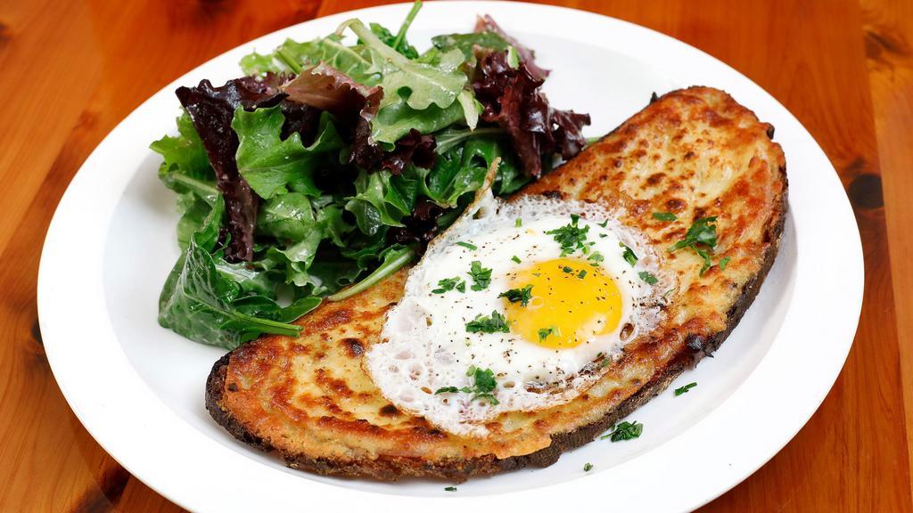 Croque Monsieur · Grilled open face ham & cheese sandwich served with organic mixed green.
