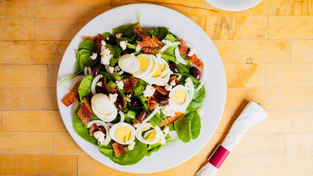 Hella Good Vegetarian Spinach Salad · Vegetarian. Spinach, feta, bacon, onion, olives, two hard-boiled eggs, house dressing.