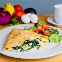Florentine Crepes · Feta, spinach, and onion. Served with salad.