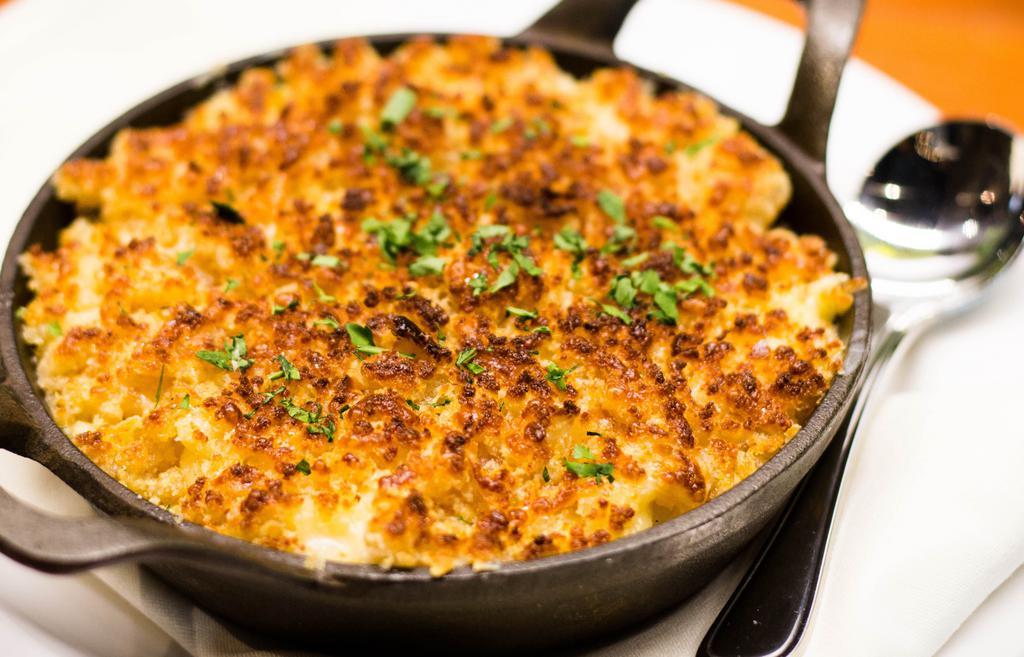 Mac & Cheese · Aged white cheddar, fontina, Parmesan, buttery bread crumbs.