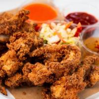 Chicken Strips · Buttermilk marinated, cage-free Petaluma chicken thighs, coated in crisp breading, served wi...