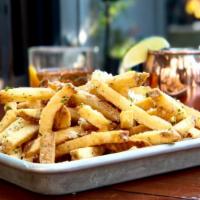 Truffle Fries · House cut Kennebec fries with truffle, parmesan and parsley, served with lemon garlic aioli