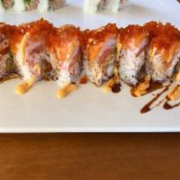 Maxi Roll · In: tempura shrimp, salmon and crab meat. Out: salmon avocado tobiko, wasabi tobiko & pink s...