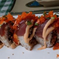 Grace Roll · In: Spicy tuna, avocado
Out: Tuna, tobiko
Sauce: Special sauce