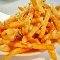 102. Butter Garlic Fries. 牛油蒜蓉薯条 · Fries mixed with our delicious house made butter garlic sauce