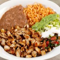 Chicken Bowl · Our marinated grilled chicken breast served with rice, beans, and salad. Topped with guacamo...
