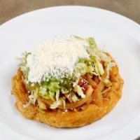 Sopes · Thick tortilla with pinched sides.  Served with your choice of beef, chicken or al pastor, b...